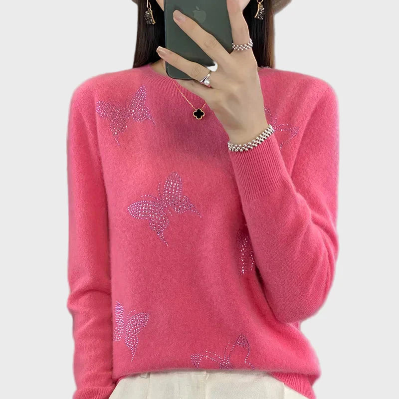 Cuello vuelto de punto con diseño de mariposa