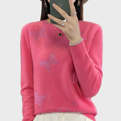 Cuello vuelto de punto con diseño de mariposa