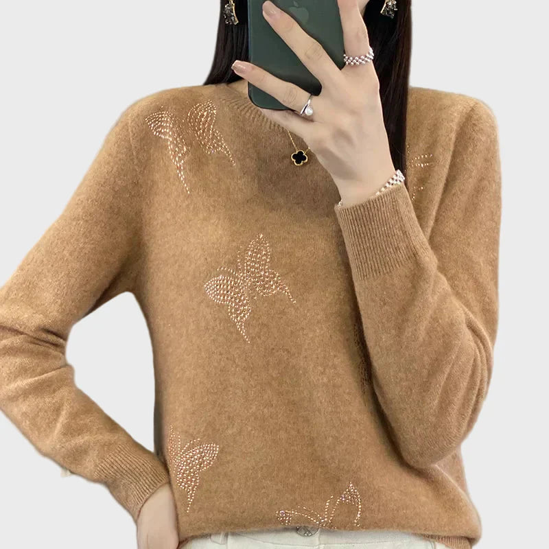 Cuello vuelto de punto con diseño de mariposa