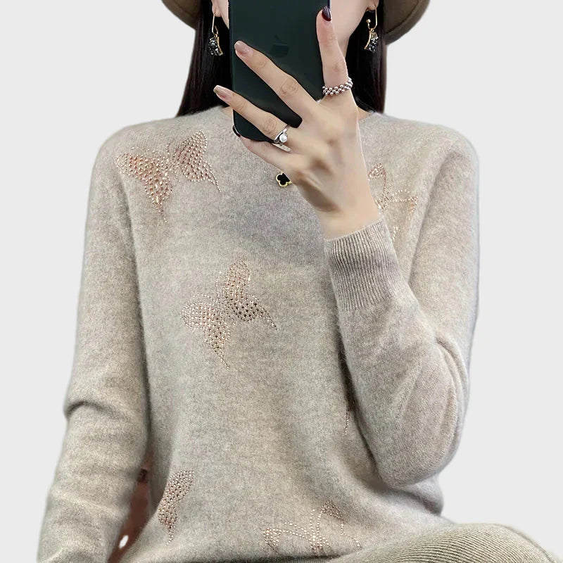 Cuello vuelto de punto con diseño de mariposa